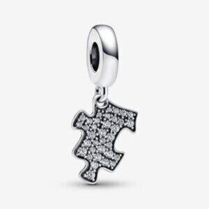 Authentic Pandora Sparkling Puzzle Piece Dangle Charm.